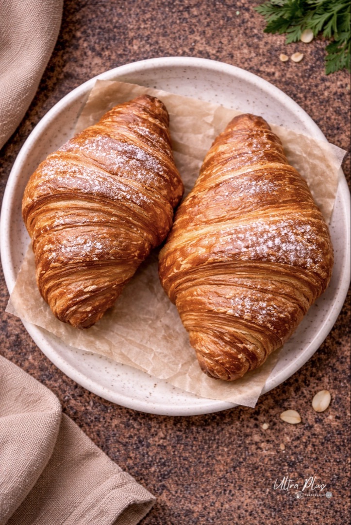 Fresh-baked croissants on a plate